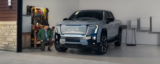 2025 GMC Sierra EV Pickup Truck Parked in a Garage